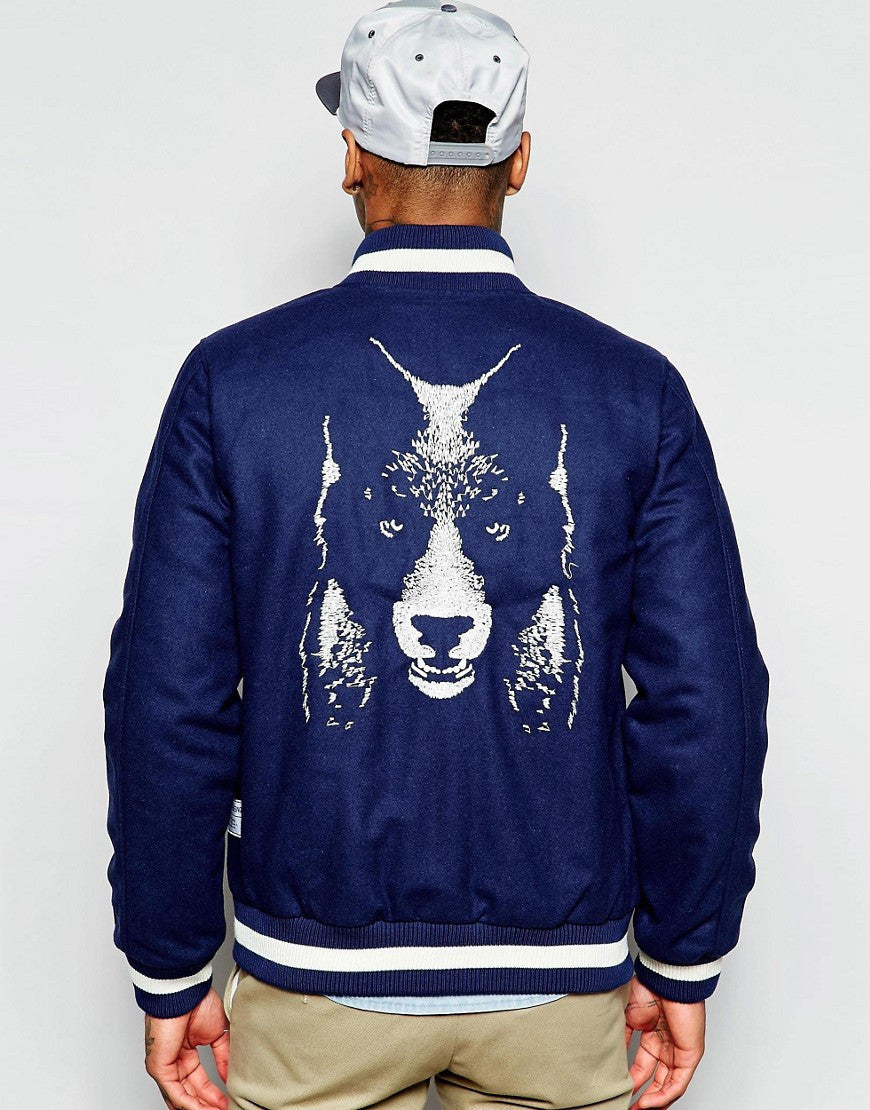 Supremebeing Varsity Jacket With Embroidered Back Print